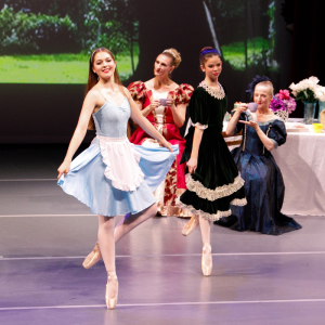 Alice dancing with her friends at a tea party, this is a scene from our full length ballet Alice in Wonderland